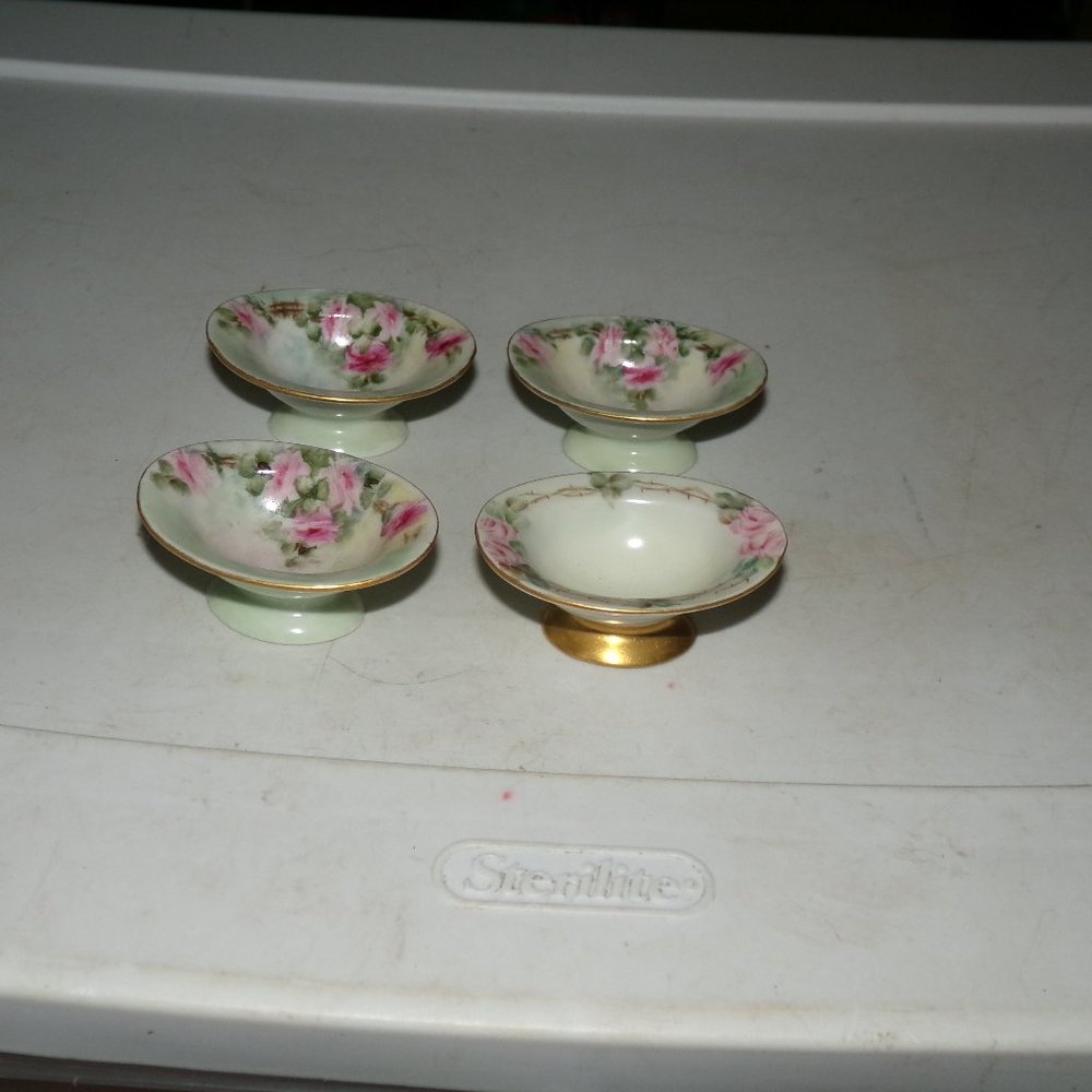 4 vintage bone china salt cellars.